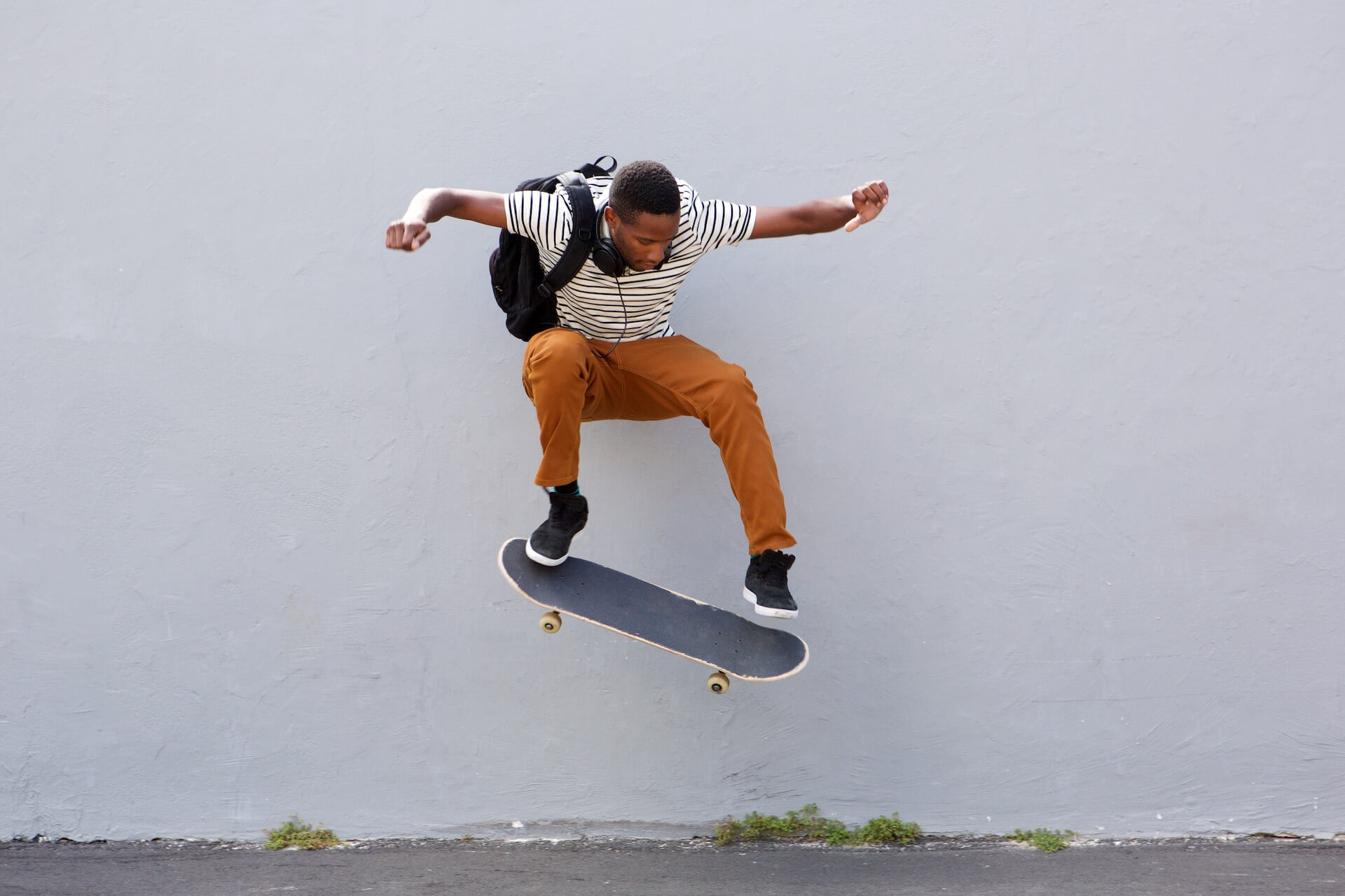 young student skateboarding